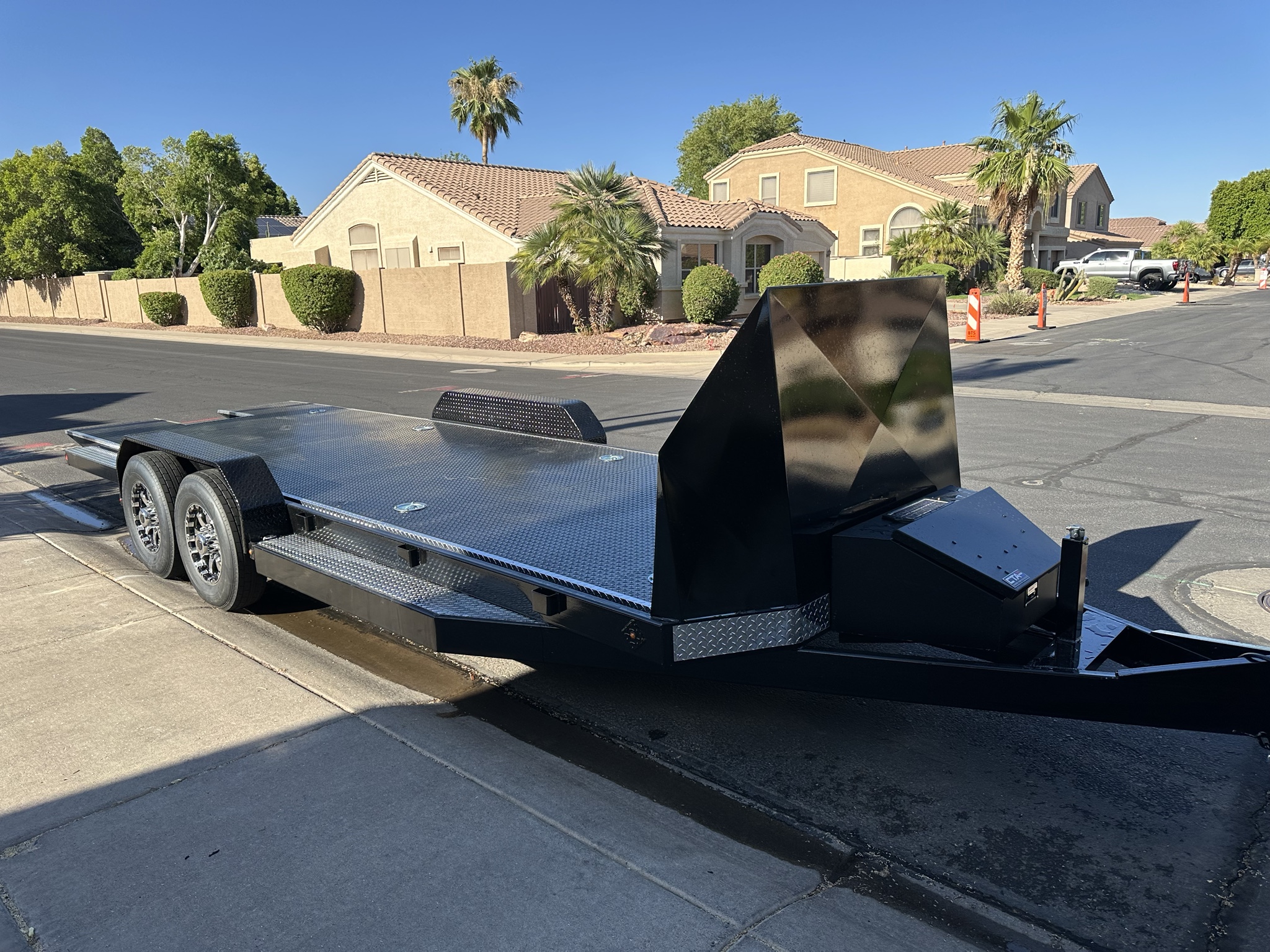 Tilt-deck trailer with hydraulic lift in Arizona neighborhood